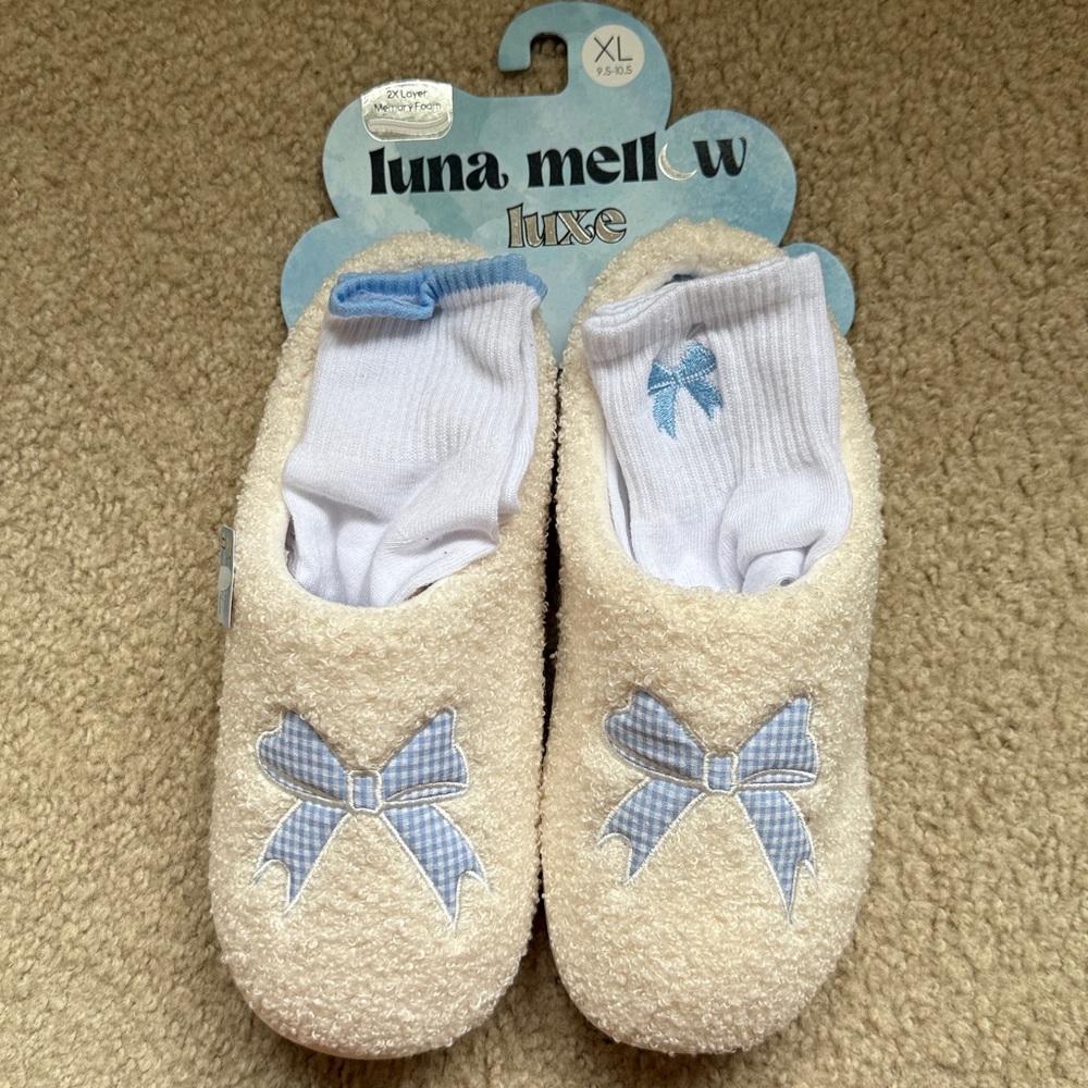 Cream Slippers with Blue Bow Accent